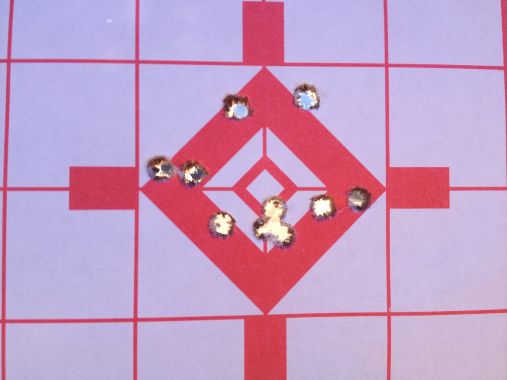 All accuracy testing consisted of ten shot groups at 50 yards from a supported position with a US Optics scope at 17x magnification. A target showing the size of a grouping.